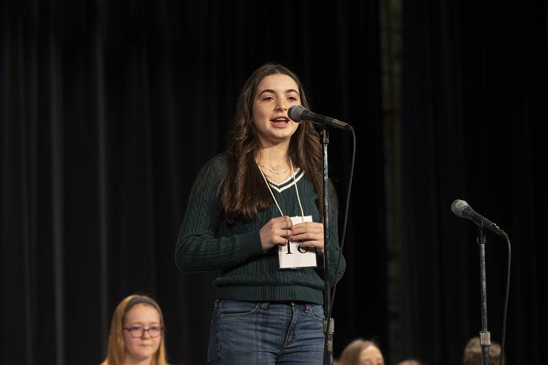 Reagan Middle School 8th grader Jenna Mustapha competes Thursday, Feb. 21, 2024 at the Lee-Ogle-Whiteside regional spelling bee. Mustapha missed on the word “millivolt” in round five.