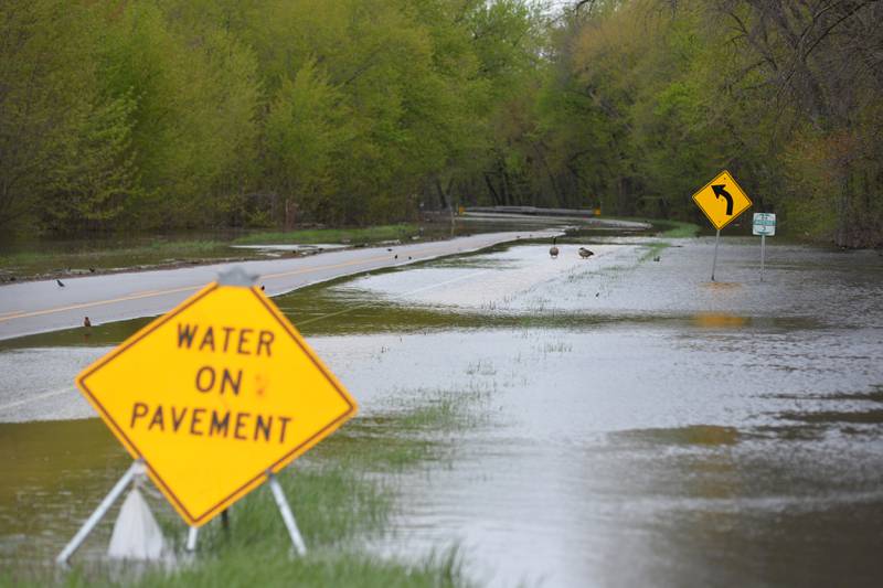 A section of U.S. Route 84 between Fulton and Albany remained closed Sunday as the Mississippi River continued to flood.