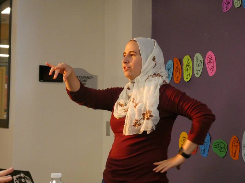 Zaineb "Zee" Abdullah, Vice President of Deaf Planet Soul, conducts a deaf sensitivity training at Algonquin Public Library's main branch off Harnish Drive on Tuesday, Aug. 23, 2022.