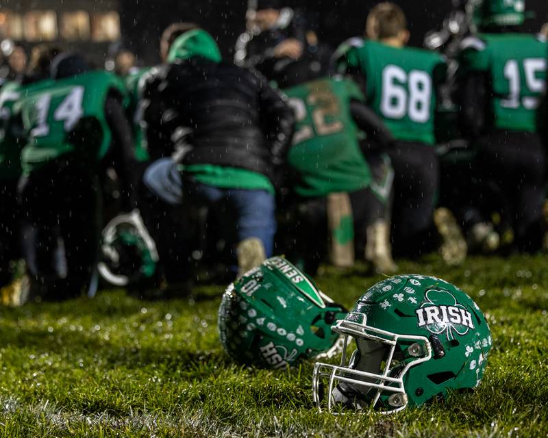 Seneca football helmets lay ahead of team during their post game huddle on Saturday, November 8, 2025 at Seneca High School in Seneca.