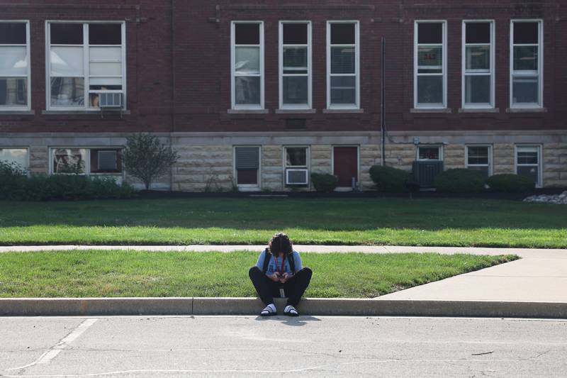 A student waits for the door to open at Lockport Township High School Central Campus on the first day of the new school year on Monday, August 19, 2024.