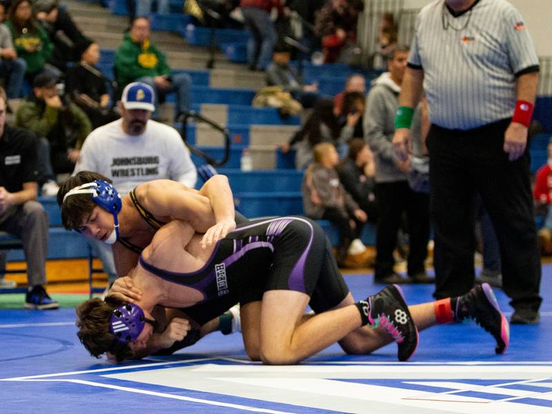 Johnsburg's Kainoa Ancog fights for position during a match earlier this season.