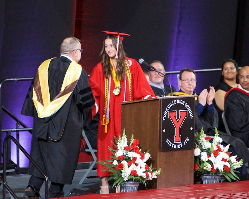 Yorkville High School Salutarian Julia Maria Housa gives the welcome address at the Commencement Ceremony at NIU Convocation Center on Friday, May 16, 2025 in DeKalb.