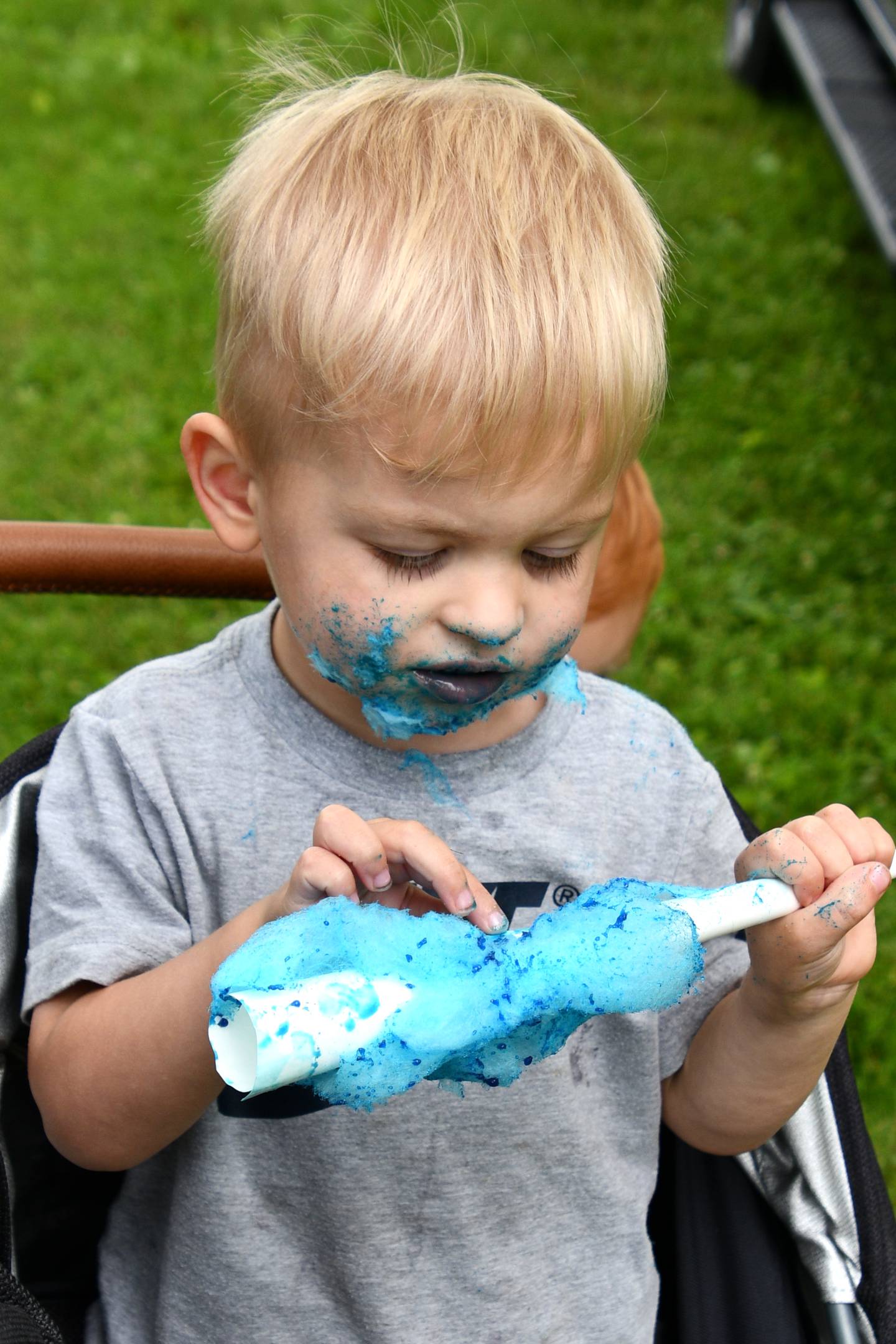 Greyson Hodges didn't seem to mind the mess of the cotton candy Saturday, June 11, 2022, during the Spring Valley Summer Fest at Kirby Park.