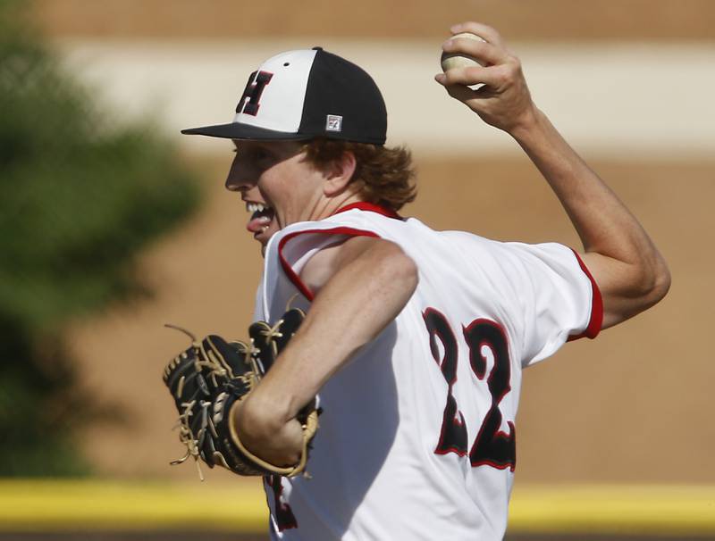 Huntly’s Adam Guazzo throws a pitch during a IHSA Class 4A baseball sectional semi-final baseball game between Jacobs and Huntley at Jacobs High School in Algonquin.