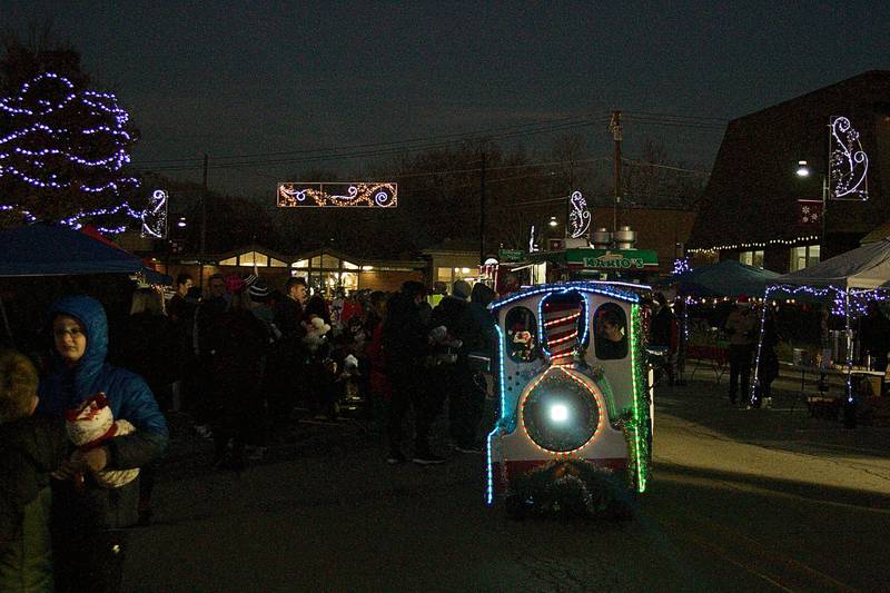 The Toyland train entertained families in downtown Oswego, bringing them from one end of Main Street to the other, during Oswego's Christmas Walk celebration Dec. 3.