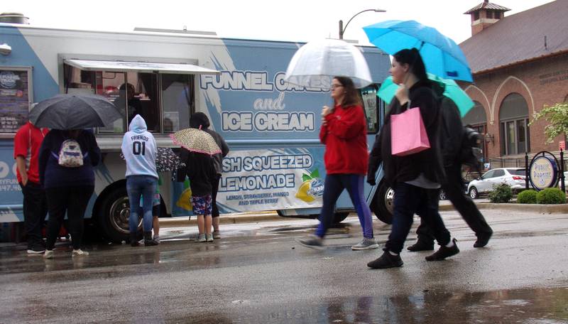 Despite some rain in the early afternoon, crowds were steady Saturday, May 21, 2022, at the Food Truck Festival in City Park in Streator.