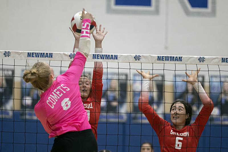 Oregon’s Lexi Ebert (left) and Sonya Plescia work against Newman’s Jess Johns Wednesday, Sept. 6, 2023 in a game at Newman High School.