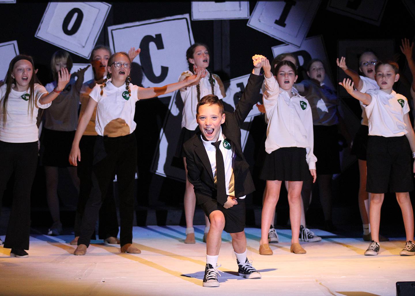 Bruce played by Rylee Oakman and students of Crunchem Hall sing during Engle Lane's "Matilda Jr. - The Musical."