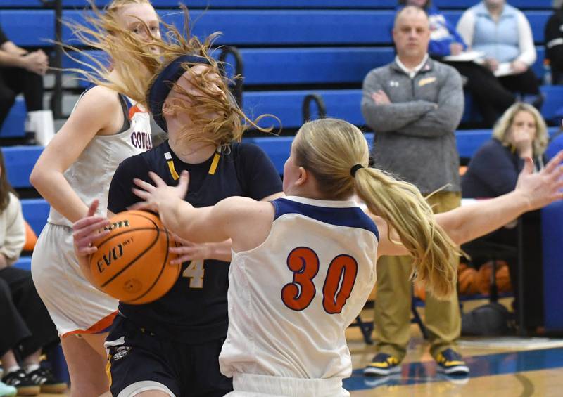 Polo's Camrynn Jones (4) collides with Eastland's Morgan McCullough (30) on Tuesday, Feb. 10, 2026 at Eastland High School in Lanark.