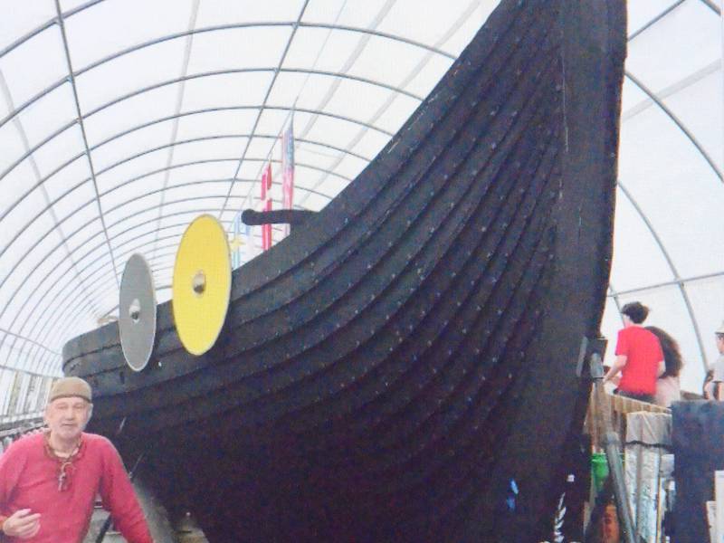 Naperville resident Dave Nordin leads a tour of the 1893 replica Viking longship on display at Good Templar Park, 528 East Side Drive in Geneva. After the ship's last tour days from 10 a.m. to 4:30 p.m. Saturday and Sunday, Oct. 19 and 20, 2024, the ship will close for winter storage.