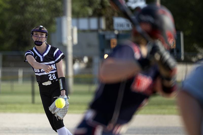 Dixon’s Allie Abell fires a pitch against Belvidere North Tuesday, May 27, 2025, during a Class 3A Regional softball game in Dixon.