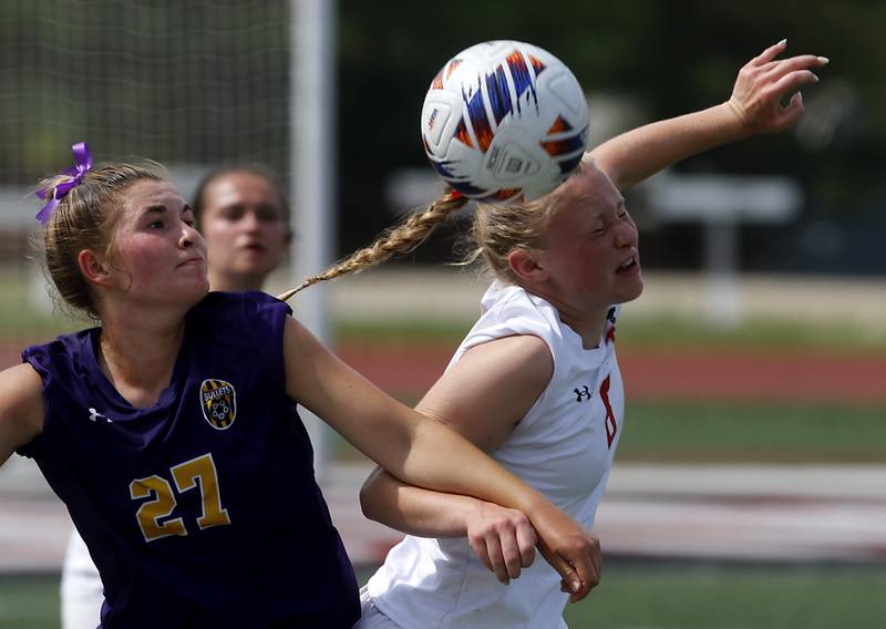 Timothy Christian's Mia Schilf (right) heads the ball away from Williamsville's Brooklyn Termine in the IHSA Class 1A State Girls Soccer third-place match on Friday, June 6, 2025, at North Central College in Naperville.