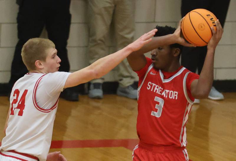 Ottawa's George Shumway defends Streator's Sharonn Morton during the Class 3A Regional semifinal game on Wednesday, Feb. 25, 2026 in Sellett Gymnasium at L-P High School.