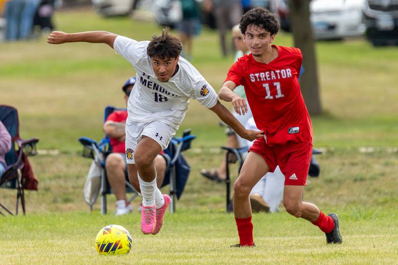 (from left) Hugo Falcon (18) of Mendota steals ball from Adrian Granados (11) of Streator on Saturday, Aug 30, 2025 at the James Street Recreation Area in Streator.