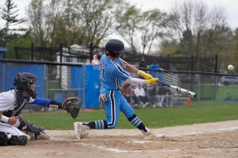 Lake Park's Derek Ittner (21) drives in a run against Geneva during a baseball game at Geneva High School on Wednesday, April 17, 2024.