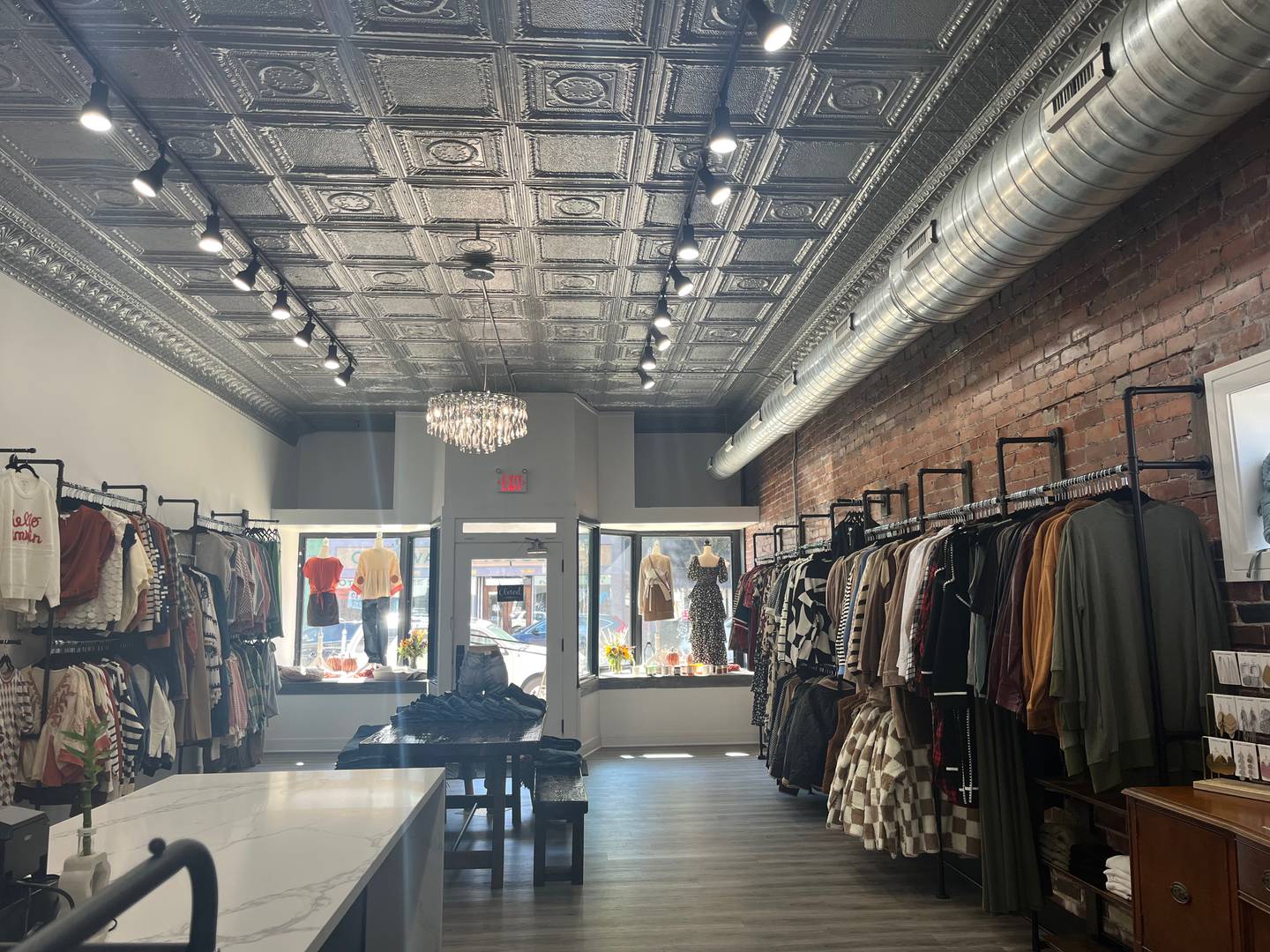 Luxx Boutique in Ottawa sells clothing, shoes, accessories, and candles from Sweet Water Decor.