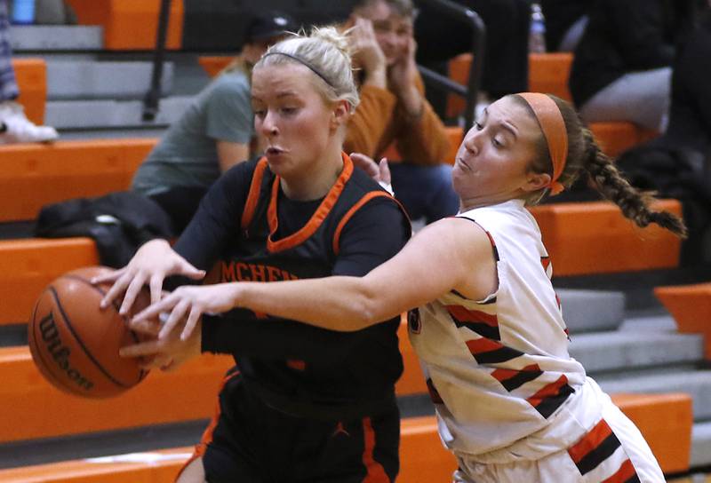McHenry's Reese Kominoski has the ball knocked away by Crystal Lake Central's Addison Cleary during a Fox Valley Conference girls basketball game Tuesday, Nov.. 29, 2022, between Crystal Lake Central and McHenry at Crystal Lake Central High School.