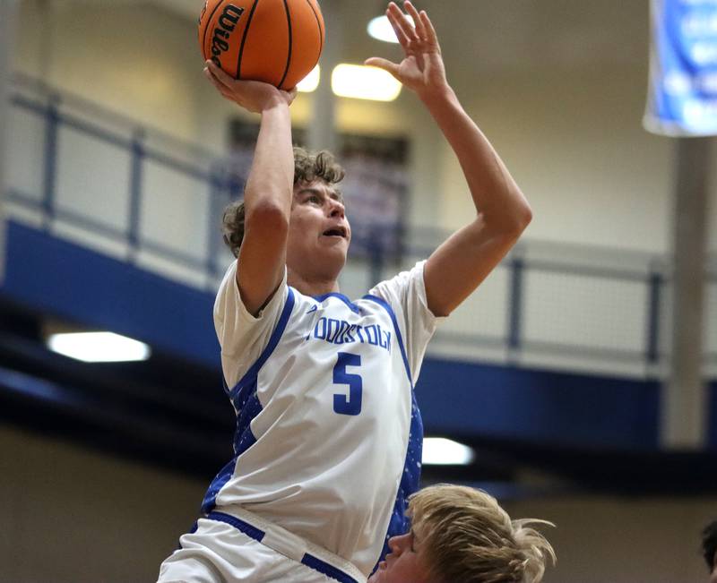 Woodstock’s Maxwell Beard soars to the hoop against Richmond-Burton in varsity basketball on Wednesday, Dec. 18, 2024 at James M. Shipley Memorial Gymnasium on the campus of Woodstock High School in Woodstock.
