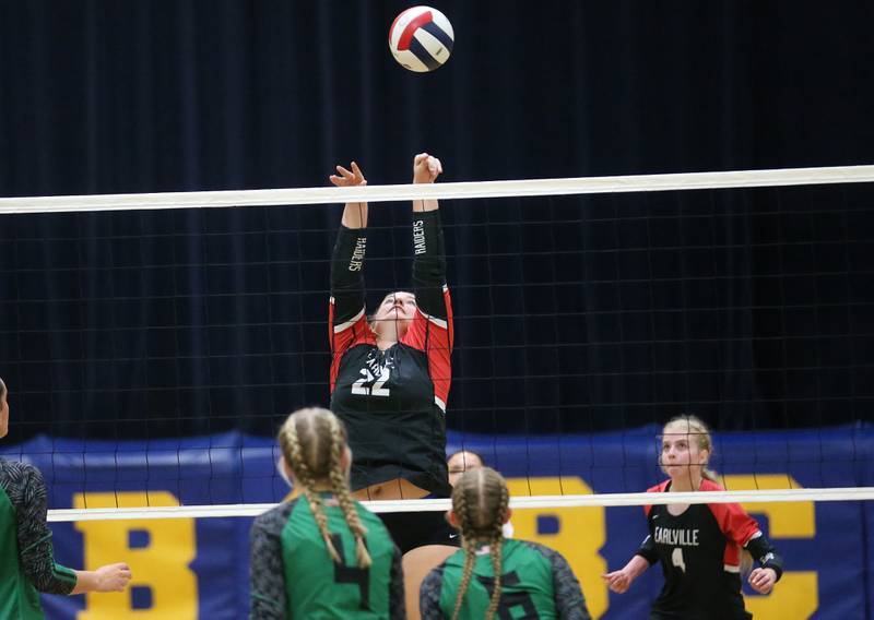 Earlville's Addison Scherer leaps in the air as the ball sails over her head during the Class 1A Regional semifinals on Monday, Oct. 27, 2025 at Somonauk High School.