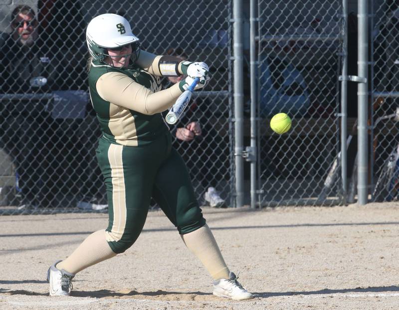 St. Bede's Macy Strauch smacks a hit against Woodland/Flanagan-Cornell on Tuesday, April 8, 2025 at Woodland High School.