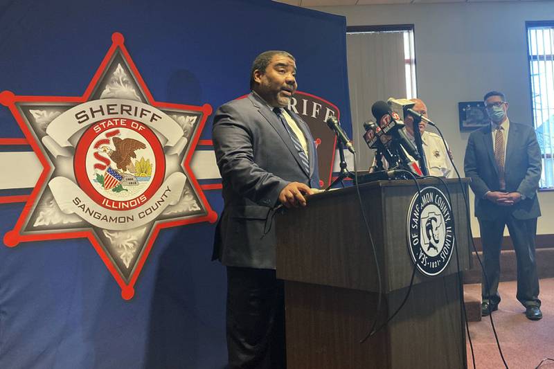 Marc Smith, director of the Illinois Department of Children and Family Services, discusses the stabbing death of state child welfare worker Diedre Silas during a news conference, Wednesday, Jan. 5, 2022, in Springfield, Ill. Silas, 36, was conducting a visit Tuesday, Jan. 4, on a home in Thayer, south of Springfield, when she was stabbed. A man living in the home, 32-year-old Benjamin H. Reed, faces charges of first-degree murder, aggravated battery and unlawful restraint. He is being held in the Sangamon County Jail on $5 million bond.  (AP Photo/John O'Connor)