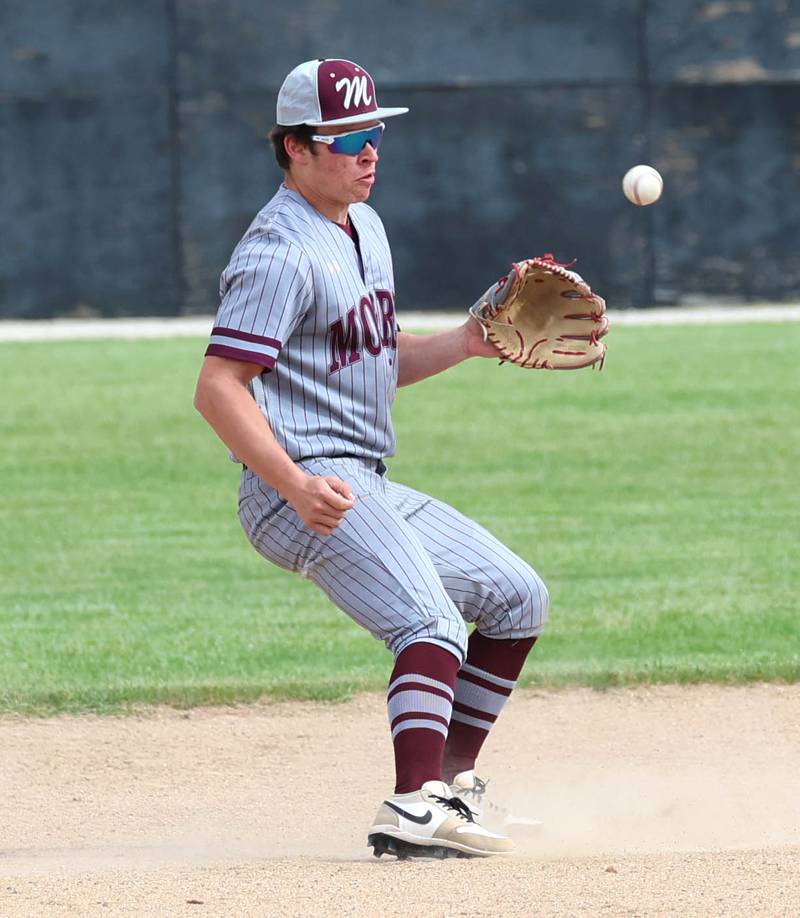 Morris' Logan Conroy tries to make a play on a tough hop Wednesday, May 13, 2026, during their game against Sycamore at the Sycamore Community Sports Complex.