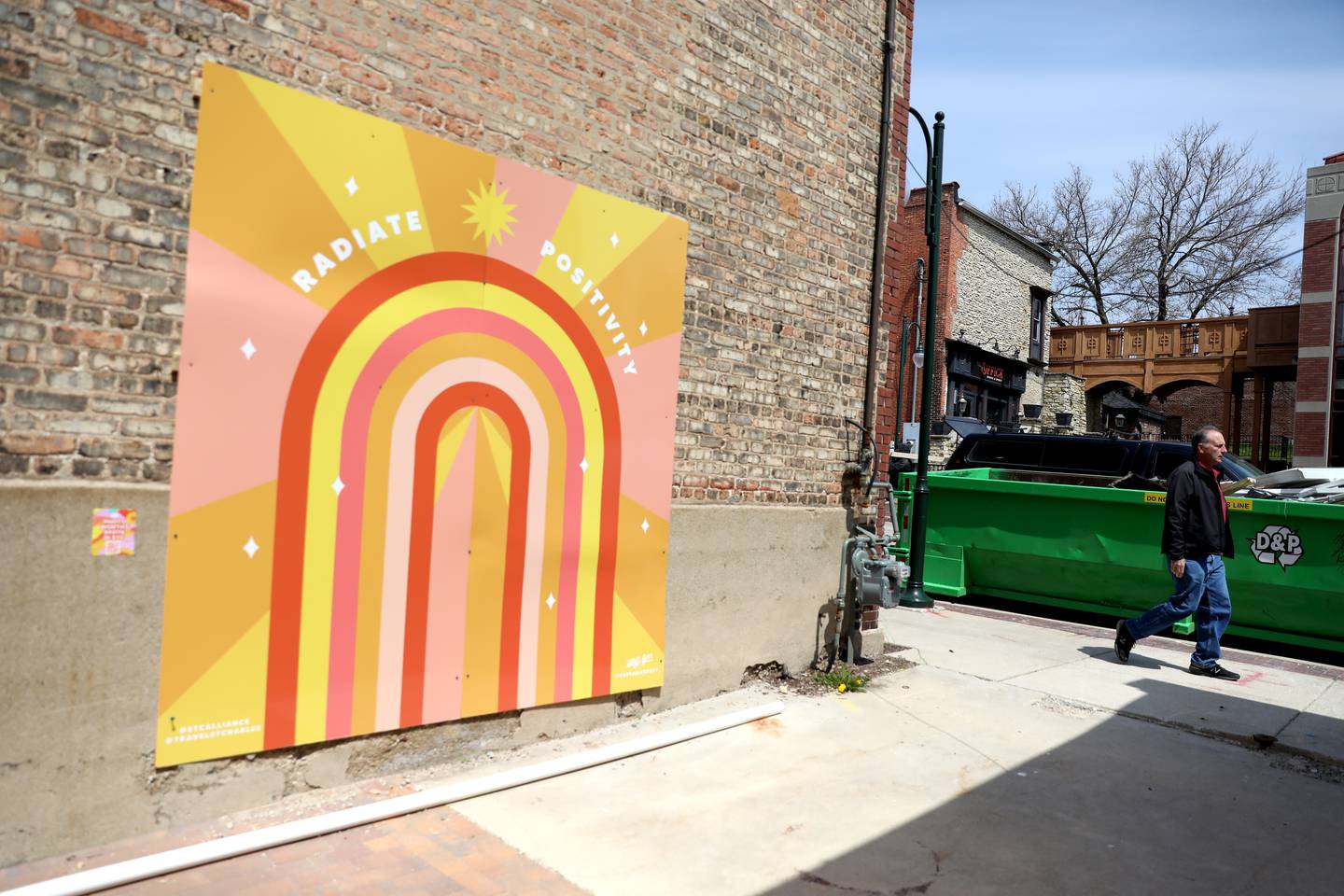 Radiate Positivity mural at 7 S. 2nd Ave. Five new murals were created by the St. Charles Business Alliance and New York artist Steffi Lynn and installed throughout Downtown St. Charles.