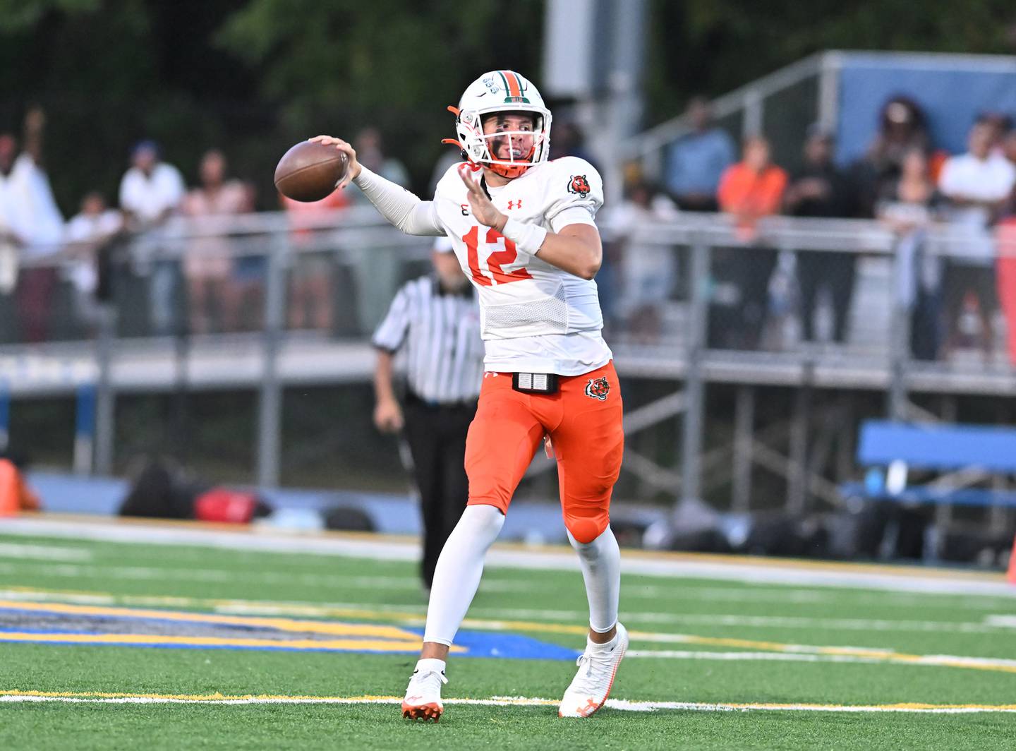 Joliet Central's Jeffrey Woods (7) looks to throw a pass during the conference game against Plainfield East on Friday, SEP. 12, 2025, at Joliet.
