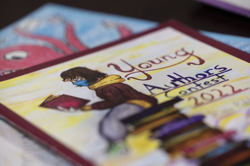 The cover art of the Young Authors Book is also part of the competition. Honorable mentions are published on the back cover.