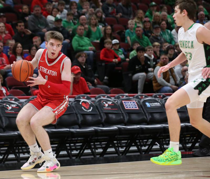 Streator's Cade Peterson looks to pass the ball as Seneca's Brady Sheedy approaches the ball during a game on Tuesday, Dec. 21, 2023 at the United Center in Chicago.