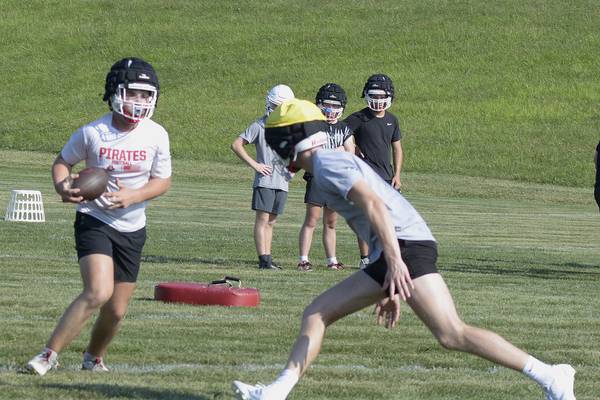 Photos: Ottawa High School, Streator and Marquette start football practices 