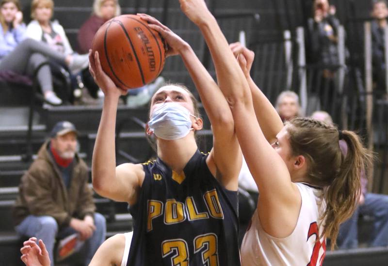 Polo's Lindee Poper shoots over Indian Creek's Audrey Witte during their Class 1A regional game Tuesday, Feb. 15, 2022, at Indian Creek High School in Shabbona.