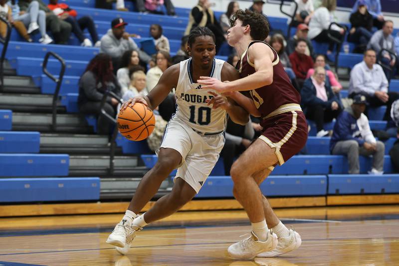 Plainfield South’s Khalil Truman drives along the baseline against Morris on Wednesday, Jan. 28, 2026 in Plainfield.
