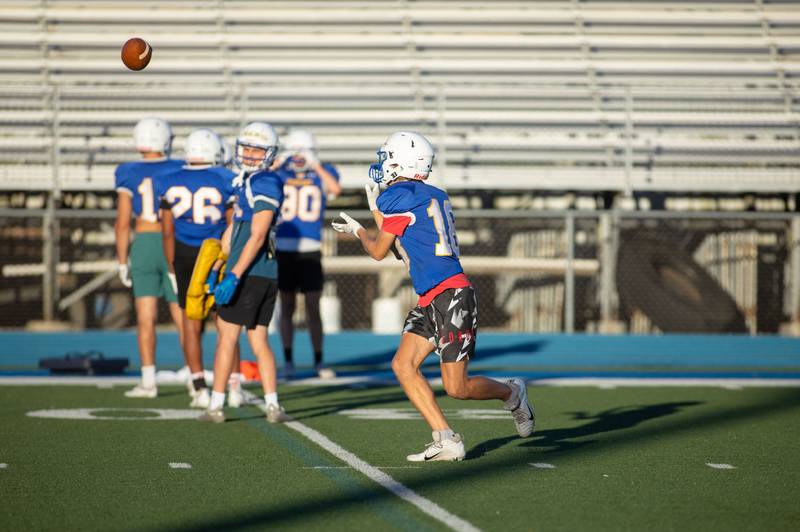 Wide receiver Brendan Wiltfang gets ready to catch the ball during practice at Wheaton North on Thursday, Aug. 11, 2022.
