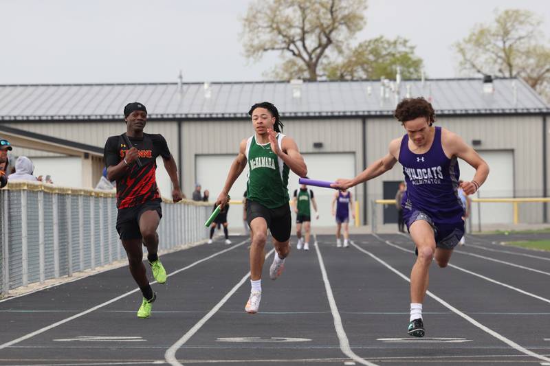 Wilmington's Billy Moore, right, crosses the finish line ahead of Bishop McNamara's Micah Lee, center, and St. Anne's Damion Wynne during the 4x100 relay race at the Herscher Track Invite on Friday, May 1, 2026.