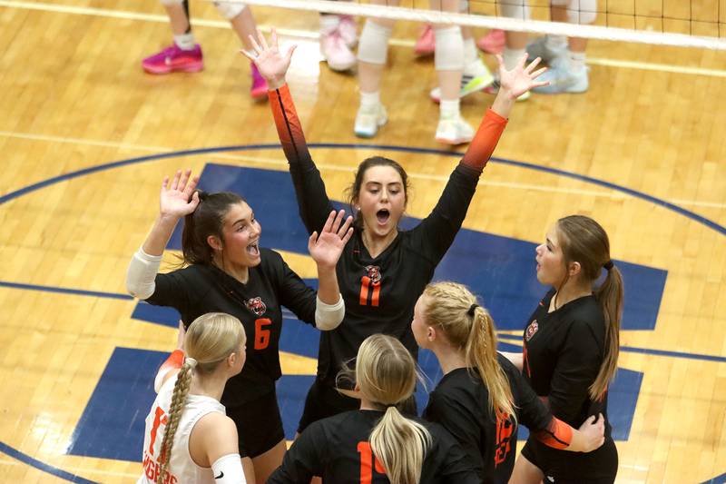 Crystal Lake Central’s Tigers get revved up during a two-set win over Woodstock North in IHSA girls volleyball Class 3A Regional Championship action at Woodstock High School in Woodstock on Thursday, October 30, 2025.