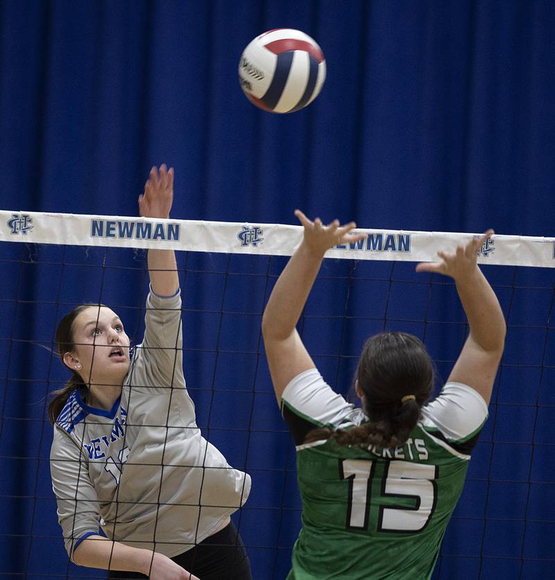 Newman’s Marykay Downs plays the ball against Rock Falls’ Lilly Betts Monday, Oct. 28, 2024, during regional play at Newman.
