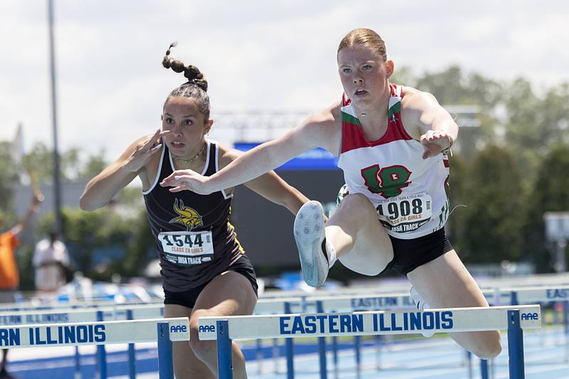 Lasalle-Peru’s Elli Sines clears the final hurdle in the 2A 100 Hurdles race Saturday, May 18, 2024 at the IHSA girls state track meet in Charleston.