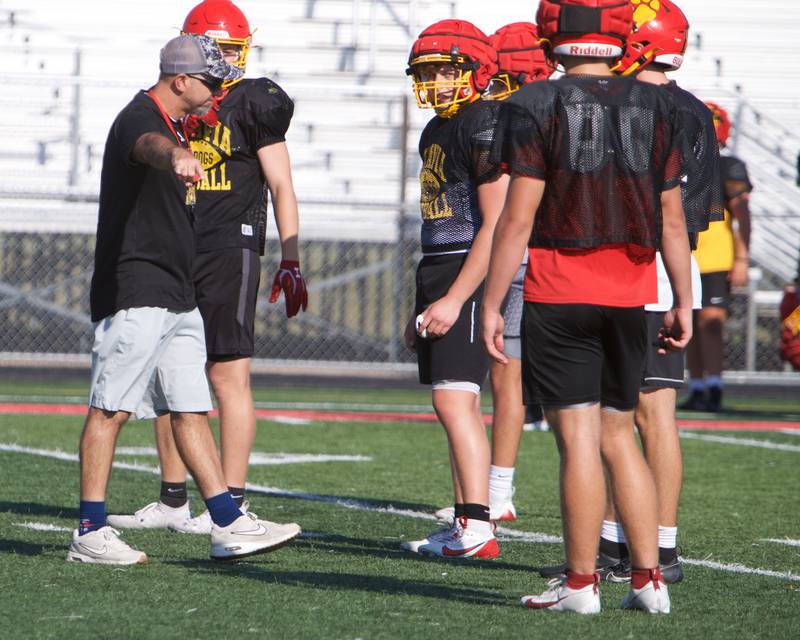 Batavia's Coach talks to players at Varsity football  practice on Wednesday, Aug.13,2025 in Batavia