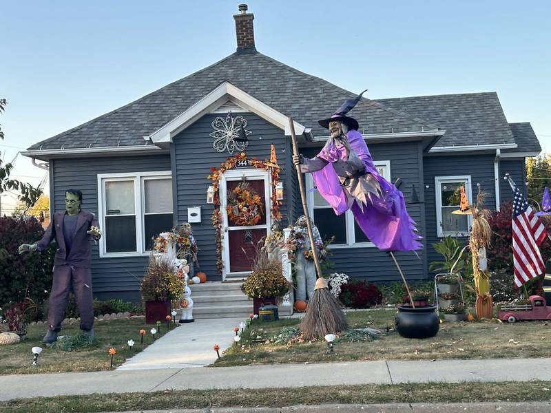 A floating witch and Frankenstein can be seen outside a home in the 300 block of Walnut Street on Sunday, Oct. 20, 2024 in Oglesby.