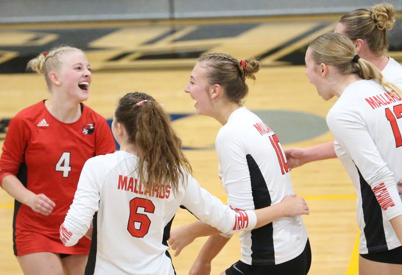 Members of the Henry-Senachwine volleyball team react after winning the second set over Putnam County during the Class 1A Regional semifinal game on Wednesday, Oct. 29, 2025 at Putnam County High School.