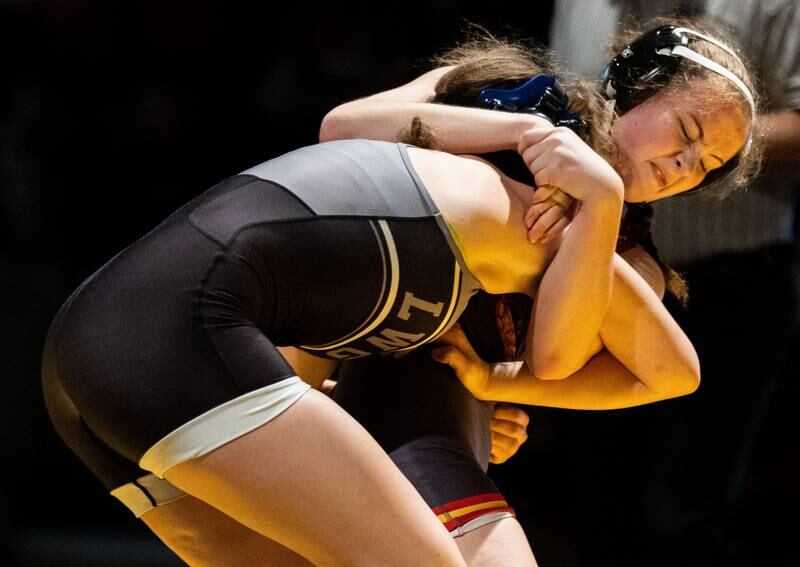 Batavia’s Lizzy Beling (back) attempts to take down Lincoln Way’s Ella Giertuga during a varsity wrestling dual at Batavia High School on Friday, Jan. 10, 2025.