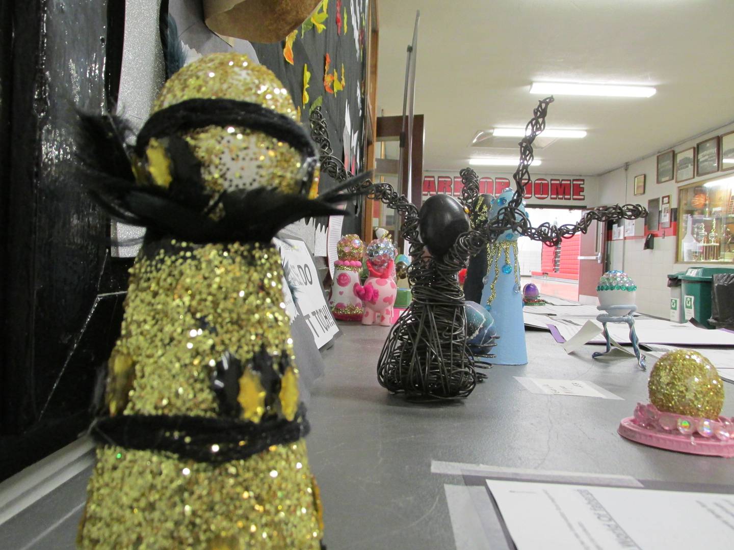 A display table near the Woodland High School gym shows off Susan Trammel's art students' Faberge egg creations.