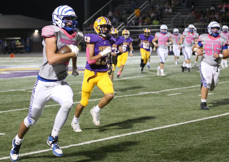 Princeton's Noah LaPorte sprints down the sideline past Mendota's Cam Wasmer on Friday, Oct. 11, 2024 at Mendota High School.