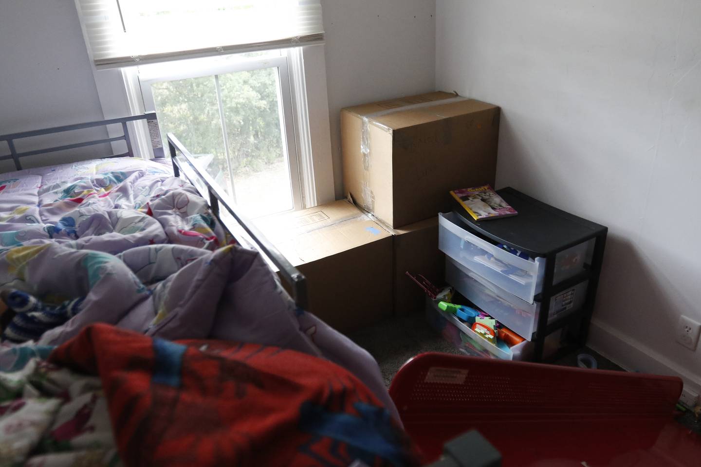 Boxes of toys from his daughter's bedroom that Ty Carter pre-packed at his Lake Villa apartment on Wednesday, August 3, 2022. Carter is looking for an affordable apartment to rent in McHenry County for his two children and himself.