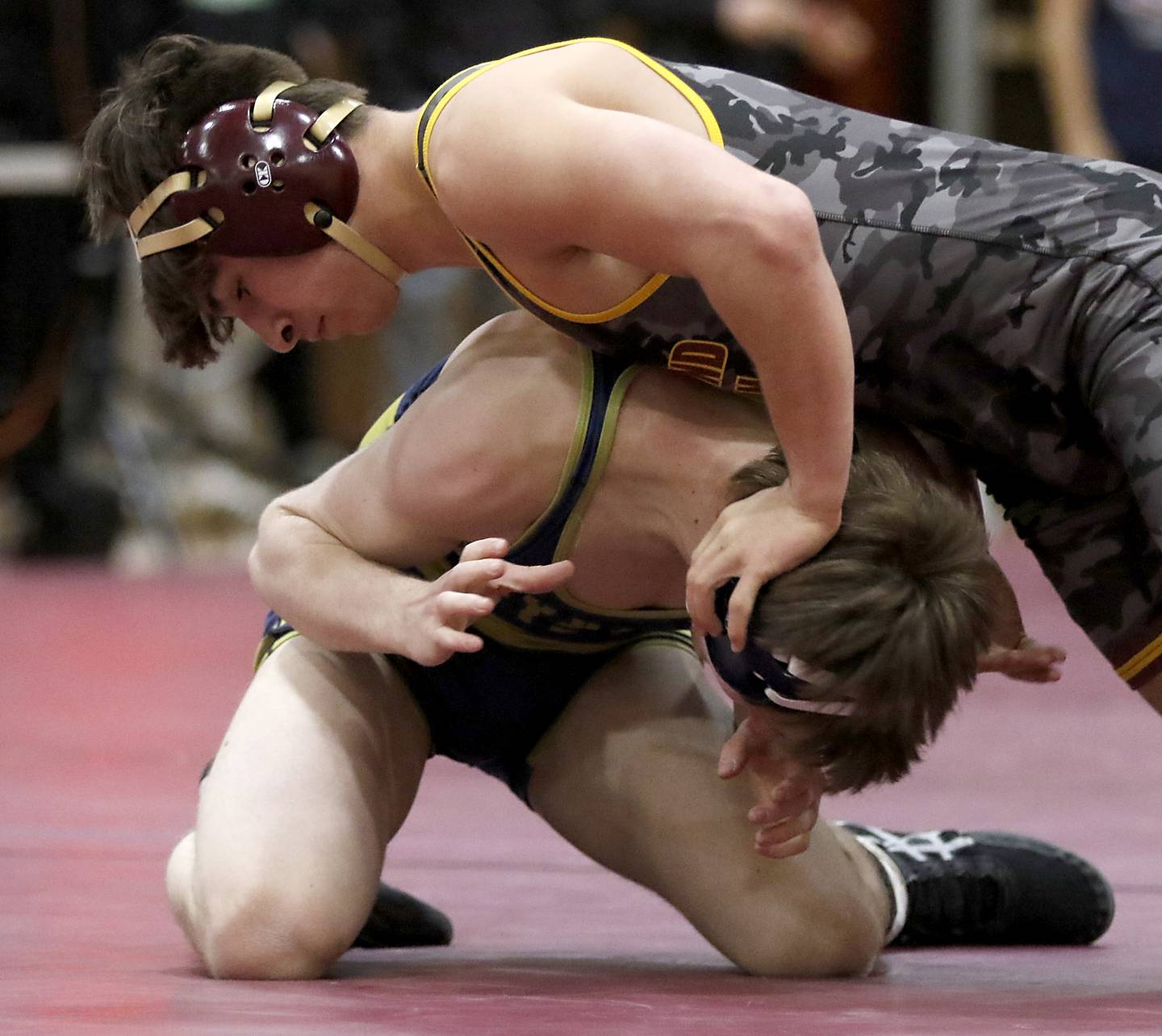 Richmond-Burton’s Emmett Nelson controls Harvest Christian’s Max Mulhearn in the 144-pound championship match of the IHSA 1A Marengo Wrestling Regional on Saturday, Feb. 8, 2025, at Marengo High School.