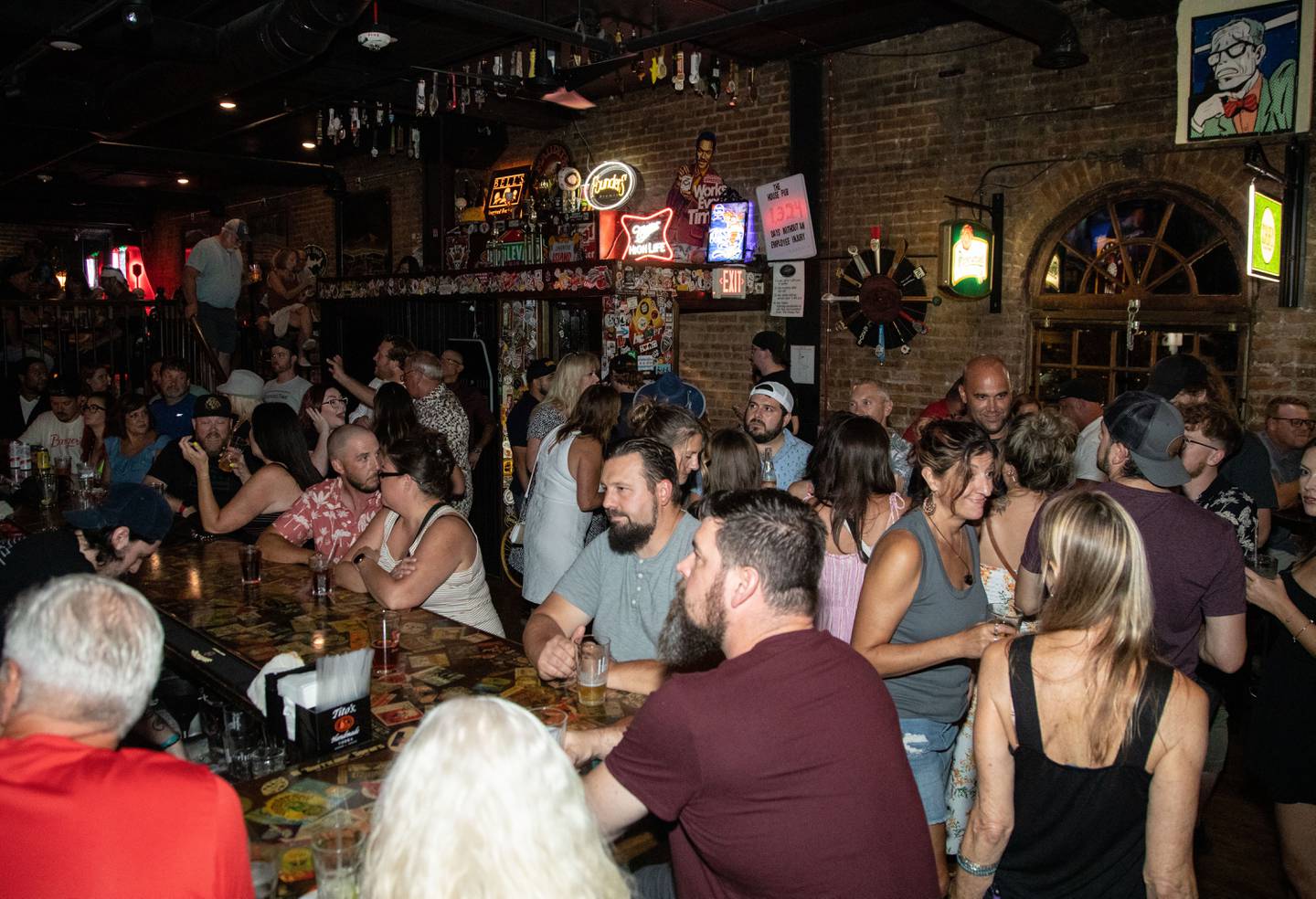The House Pub full of people in St. Charles on Friday, July 28, 2023. The House Pub has re-opened after roughly three years of being closed.
