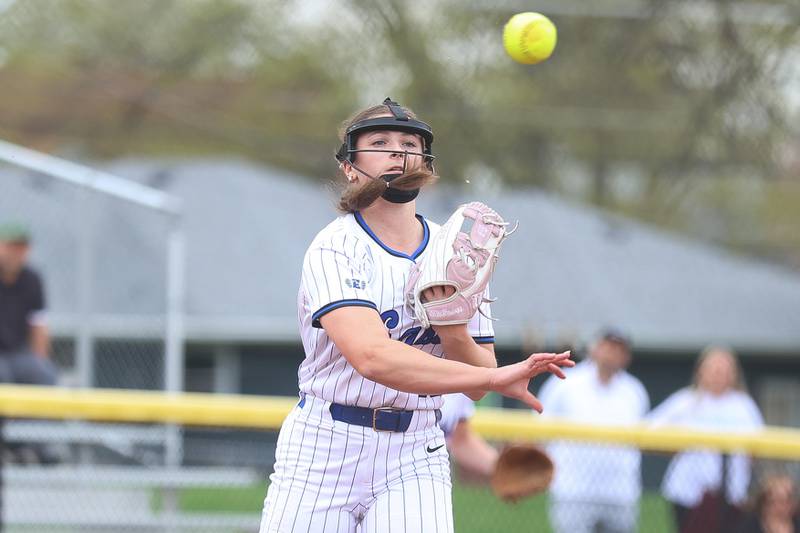 Lincoln-Way East’s Mia Balta throws to first for the out against Lockport on Monday, April 13, 2026 in Lockport.