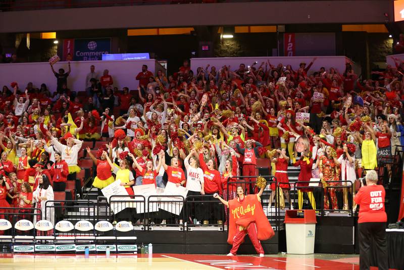 Mother McAuley fans cheer on their volleyball team in the Class 4A semifinal game on Friday, Nov. 11, 2022 at Redbird Arena in Normal.